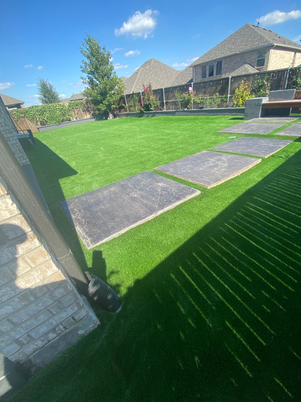 Finished view of a completed 2,000-square-foot artificial turf cleaning in Celina, Texas